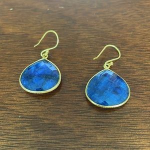 Gold tear drop earrings with blue stone
